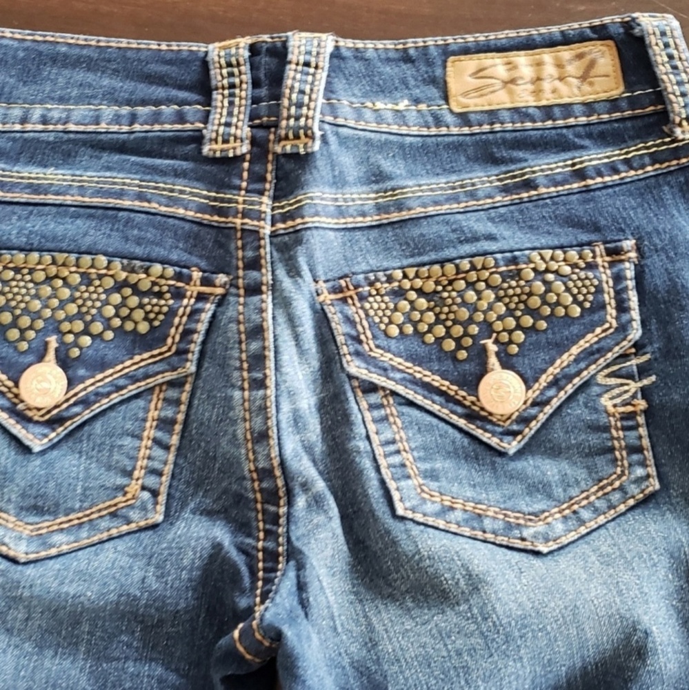 Seven Jeans with gold studded pockets size 4